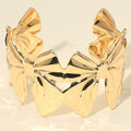 Gold bow stainless steel cuff